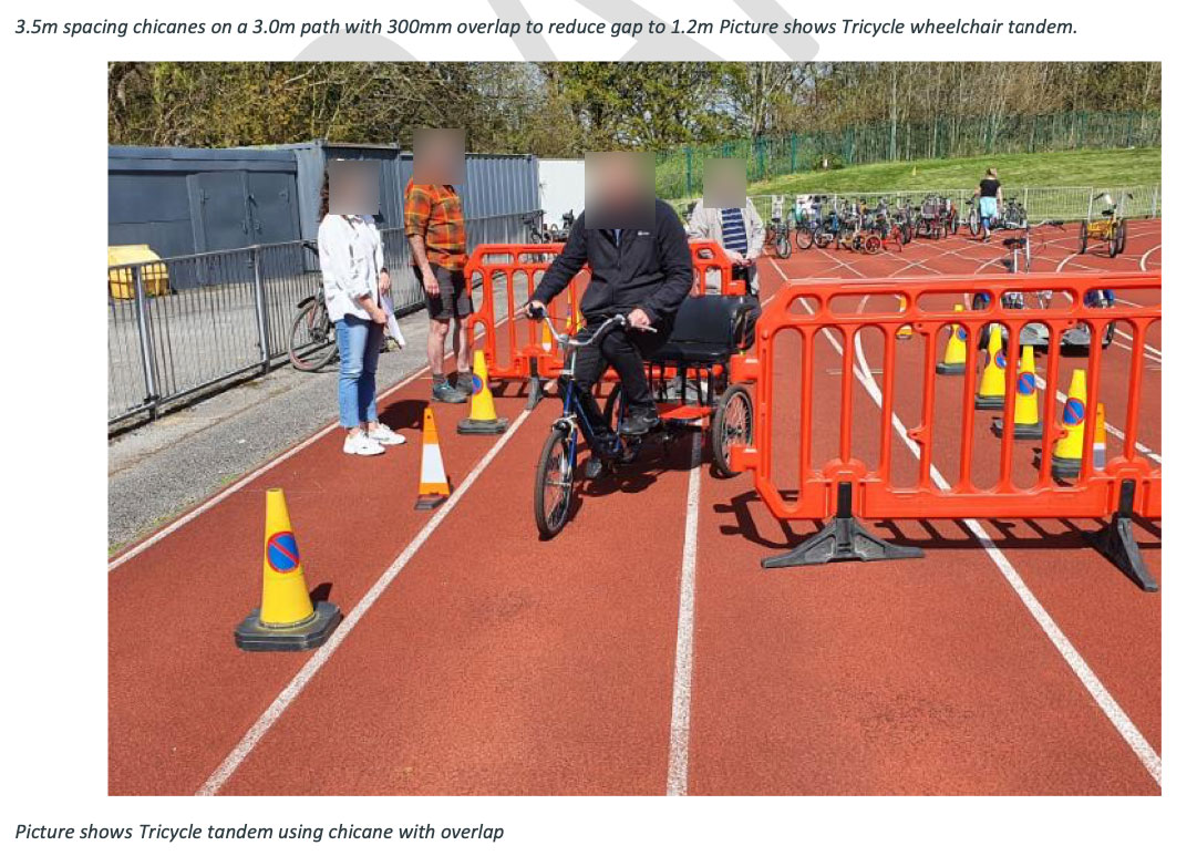 Photo showing council officers on adapted cycles trialling an overlapped chicane using temporary barriers and cones.