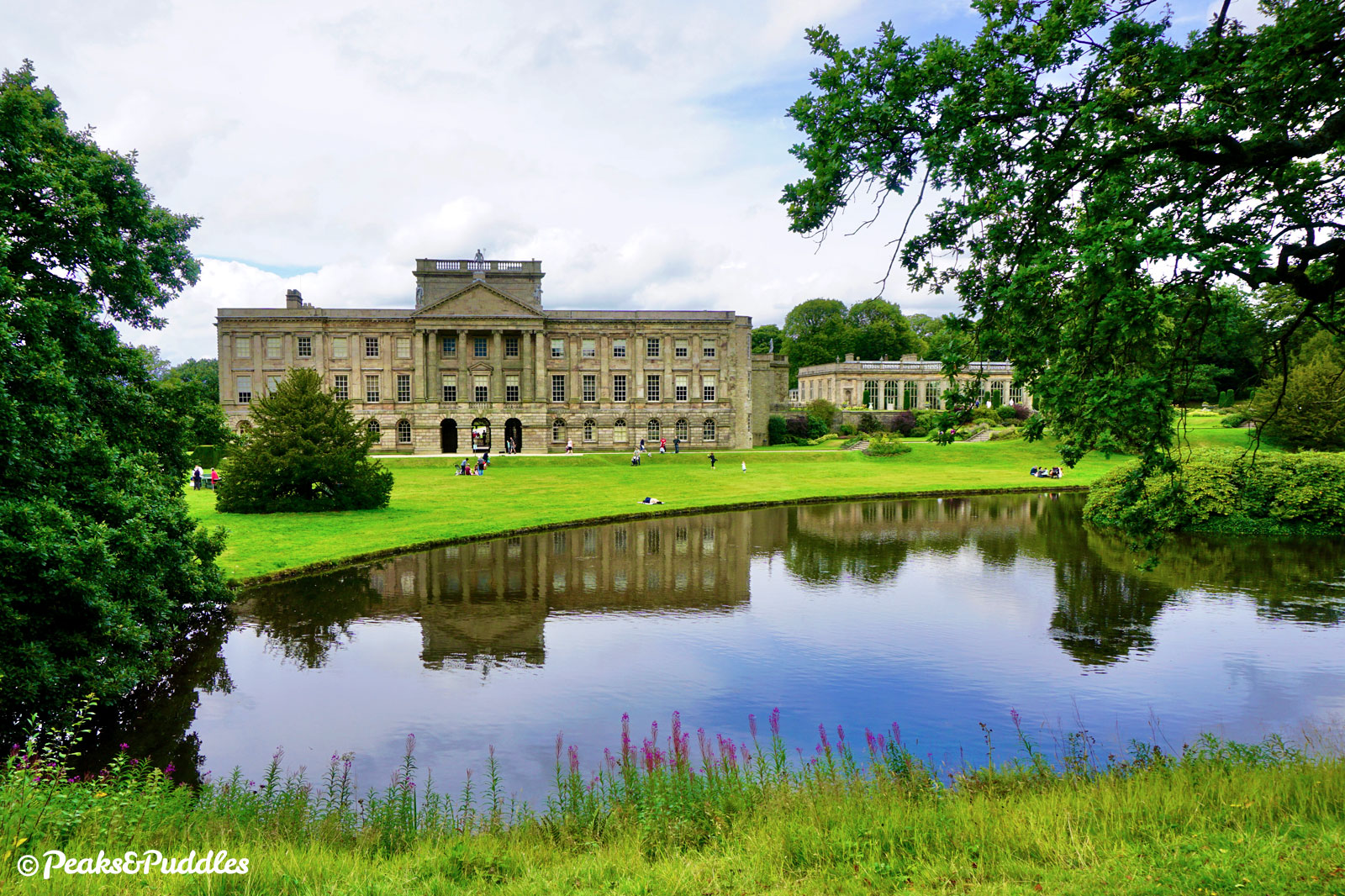Lyme Hall and its Orangery seen from across the famous pond in its landscaped gardens (entry fee required).