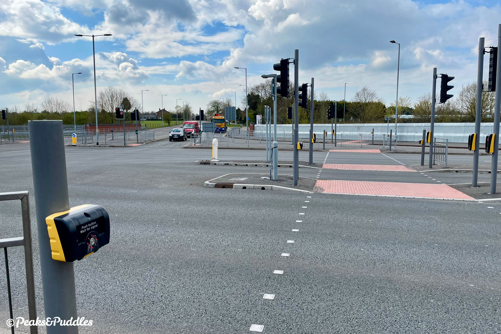 A diagonal crossing of the A555 and Styal Road requires a convoluted route across endless islands - but at least you're separate from traffic.