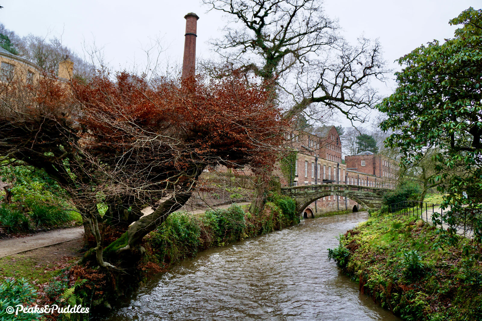 Looking towards Quarry Bank Mill from within its adjoining gardens (entry fee required), next to the raging River Bollin.